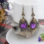 Boucle d&rsquo;Oreille Pirate Crâne Doré Pierre Rouge — Trésor Pirate (vue 10)