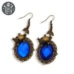 Boucle d&rsquo;Oreille Pirate Crâne Doré Pierre Rouge — Trésor Pirate (vue 7)