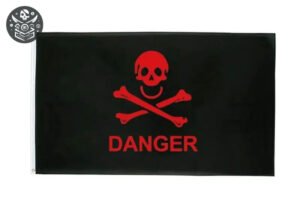 Drapeau pirate avec crâne rouge et os croisés, marque ’DANGER’ - Drapeau Pirate de Qualité